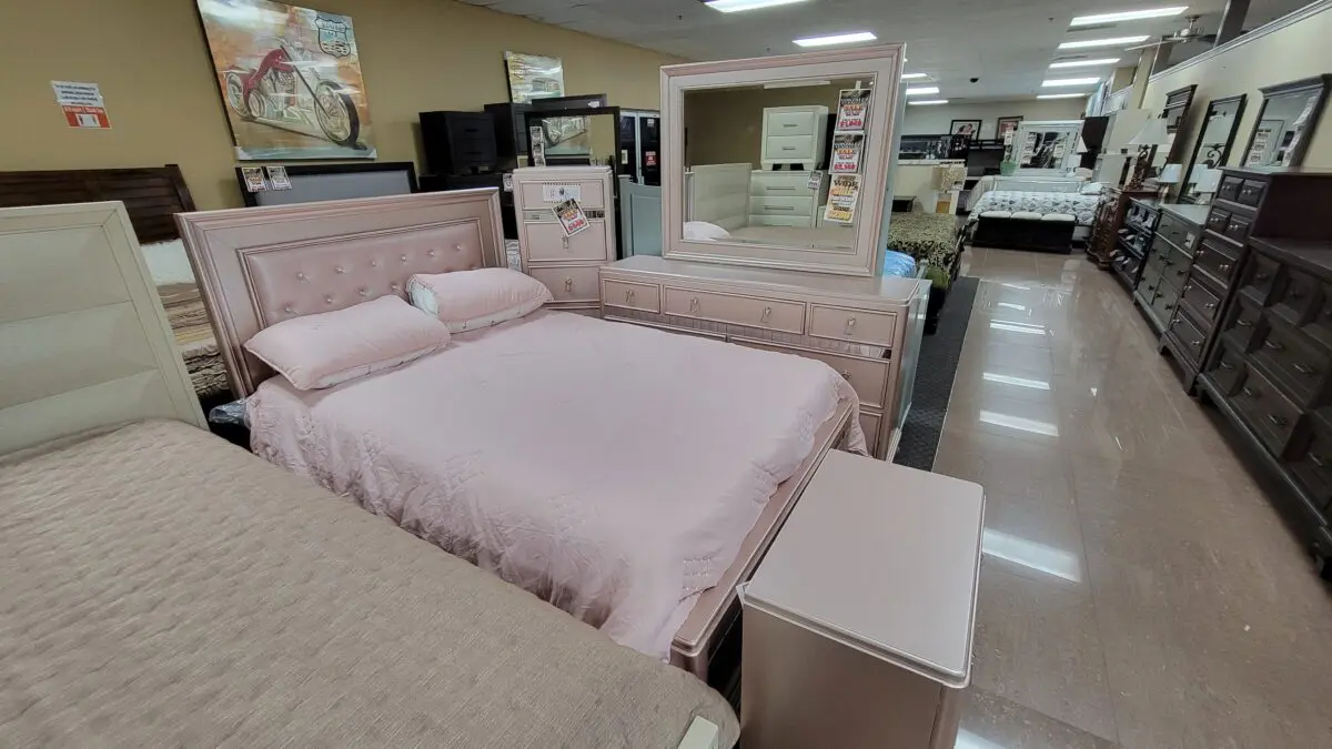 Ariston 6 Piece Bedroom Set in light pink featuring headboard, footboard, rails, nightstand, dresser, and mirror.