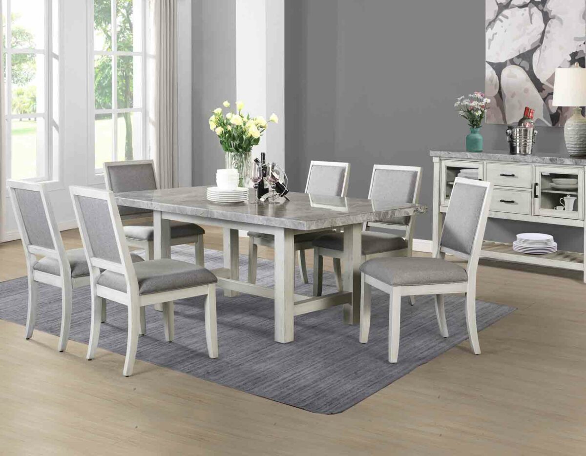 Pine wood dining table with gray marble top and white finish, seating six people comfortably. Cross-stretchers and corner-blocked table top provide stability and durability. 7 piece dining room set with classic, contemporary or farmhouse style.