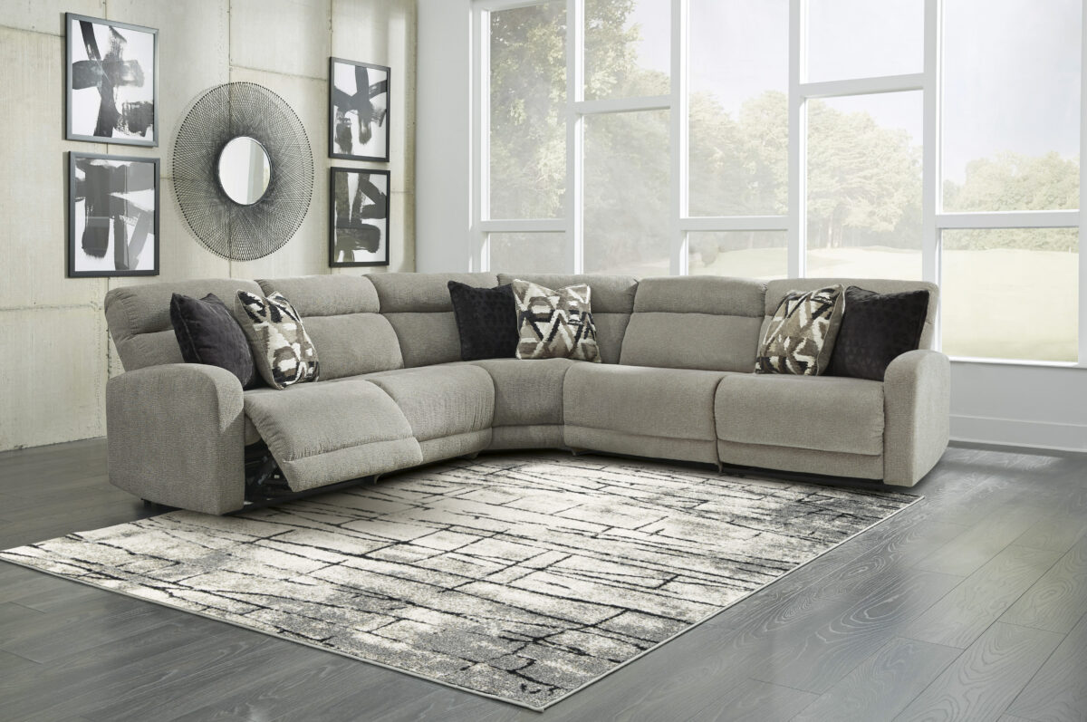 Plush stone-tone polyester sectional sofa with 5 pieces, including two armless chairs, left and right-arm facing zero wall power recliners, and a wedge. One-touch power control with adjustable positions and zero-draw USB plug-in for convenience. Corner-blocked frame with metal reinforced seat, attached back and seat cushions, and high-resiliency foam cushions wrapped in thick poly fiber for durability and comfort. Zero wall design requires minimal space between wall and chair back. Power cord included; UL Listed.