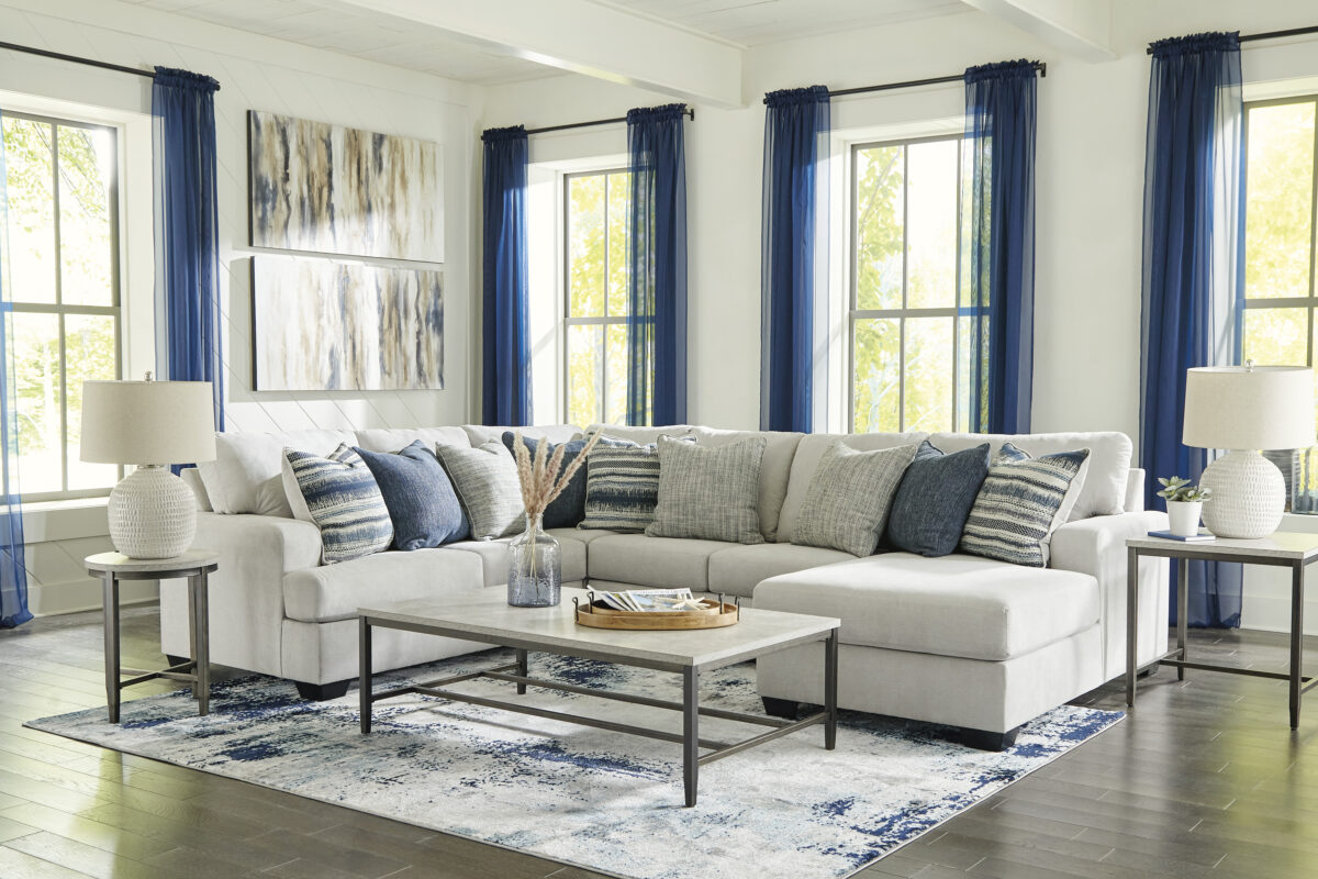 Lowder 4 Piece Sectional with Chaise in Stone Gray, includes left-arm facing loveseat, armless sofa, wedge, and reversible corner chaise, adorned with soft polyfill accent pillows