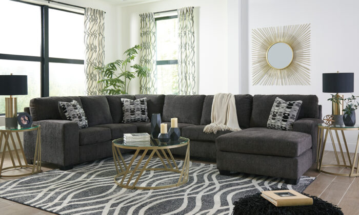 Ballinasloe Smoke 3-Piece Sectional with Chaise, featuring a left-arm facing corner chaise, armless loveseat, and right-arm facing sofa with soft gray polyester upholstery and plush cushions