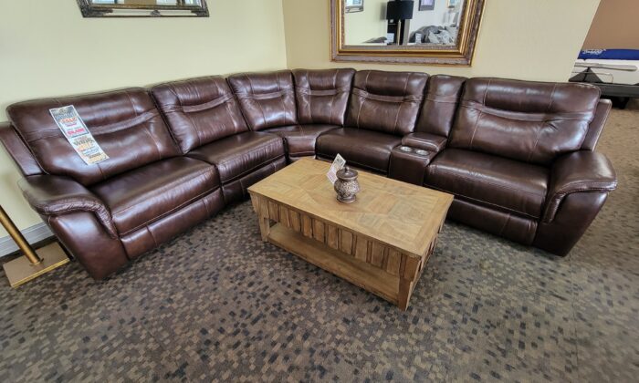 5169 Dark Brown Sectional Living Room Set in top grain leather with modular pieces, manual recliners, and USB-equipped console, designed for comfort and versatility.
