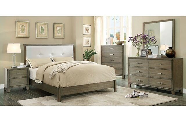 Enrico 6 Piece bedroom set in gray with button-tufted leatherette headboard and matching furniture pieces.